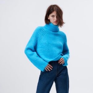 Blue Zara sweater.